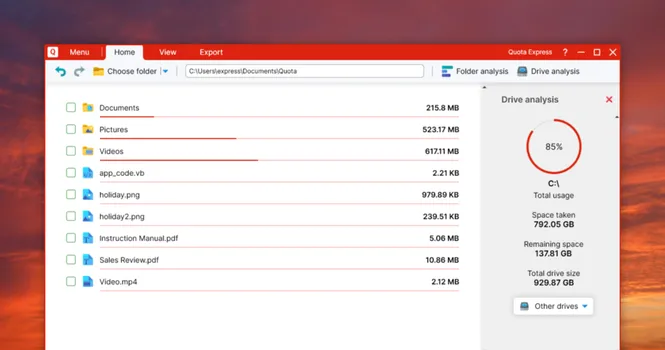 Screenshot of the Quota Express interface against a red sunset background